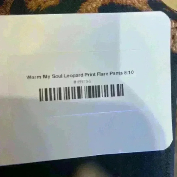 Perfectly Priscilla stretchy leopard flare pants. Size Large. New with tags! 🐆 - Picture 4 of 6